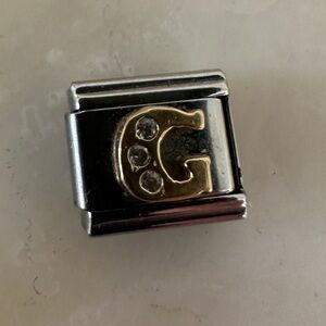 Zoppini initial G charm